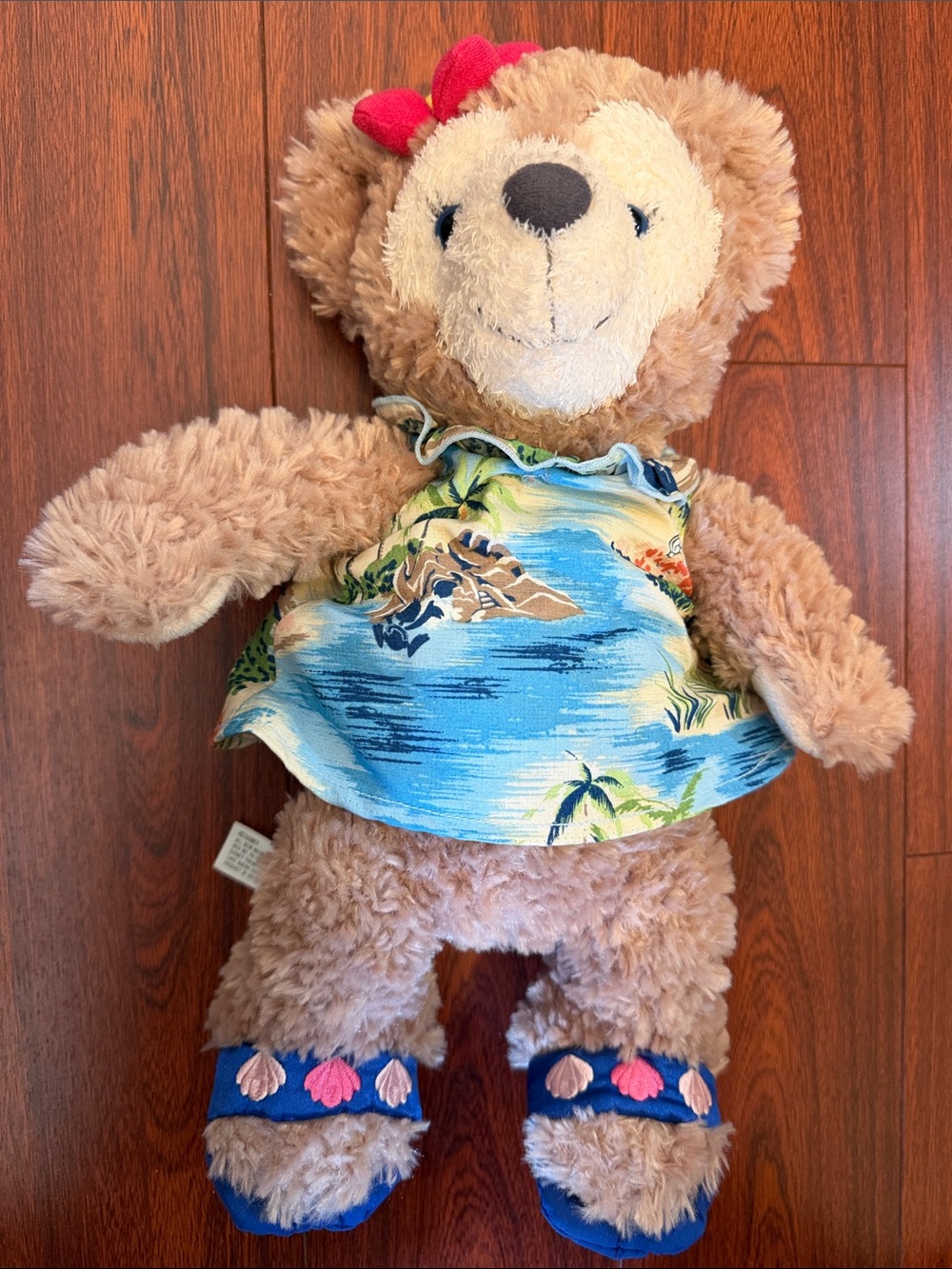 Disney’s Shellie May Plush Teddy Bear in Light Brown with Blue Hawaiian Dress